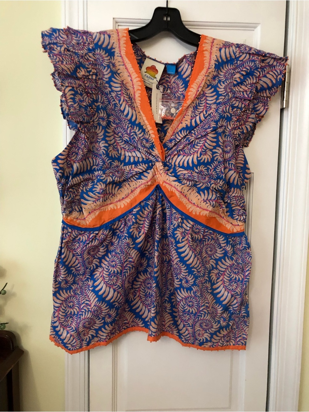 Anthropologie Blue and Orange Printed Flutter-Sleeve Tunic